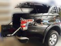 Nắp thùng mở 90 độ Mitsubishi Triton SM1