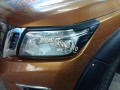 Viền đèn pha đen NISSAN NAVARA