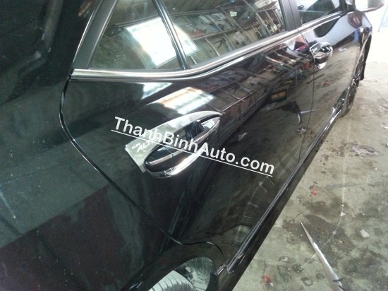 Op tay cua xi ma Corolla Altis 2014